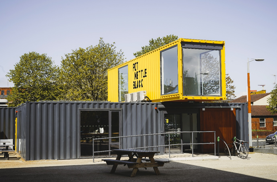 8 Ways to Transform Used Shipping Containers - yellow shipping container